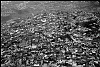 Pakistan, Kashmir  dec2005/febr2006<br>Arial of the city of Muzafarrabad, 80 % of the homes is beyond repair.<br><br>More than 70.000 people have lost their lives during the earthquake in the Pakistan Kashmir regions on October 8.<br>Cities like Balakot , near the epical center report close to 100% destroyed homes that are beyond rebuilding.<br>In the mountain regions of Kashmir, people are difficult to reach and some area's can only be accessed after spring arrives.<br>This creates a huge flood of people that flee the mountains during wintertime, facing the dangerous landslides,<br>to arrive in the hands of the Aid agencies who have a huge task, while some have lack of funding.<br>The fear of total isolation, outbreak of diseases, and traumatized victims is a  long task for the future.<br>In the tents, life tries to find it's rules again, the refugees  try to forget all they have lost and hope for a better future.<br>