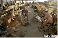 Dutch marines relaxing outside on the railway yard, Camp Smitty, 06 August 2003